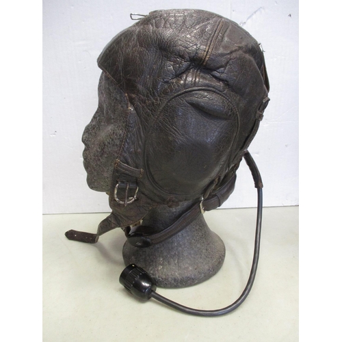 145 - Luftwaffe Winter Flying Helmet LKpW101 with throat mike and lead, brown leather shell with wool lini... 