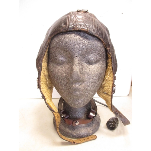 145 - Luftwaffe Winter Flying Helmet LKpW101 with throat mike and lead, brown leather shell with wool lini... 