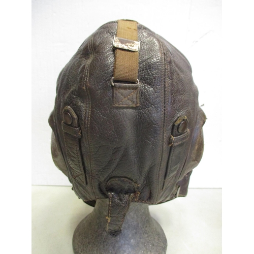 160 - Luftwaffe Winter Flying Helmet LKpW101, brown leather shell with wool lining, Siemens maker's label,... 