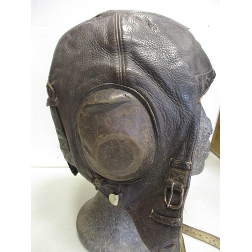 160 - Luftwaffe Winter Flying Helmet LKpW101, brown leather shell with wool lining, Siemens maker's label,... 