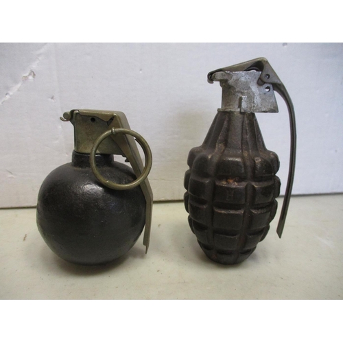 165 - Militaria. Range of deactivated hand grenades with British No 36M Mk I dated 45, similar but a battl... 