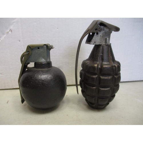 165 - Militaria. Range of deactivated hand grenades with British No 36M Mk I dated 45, similar but a battl... 