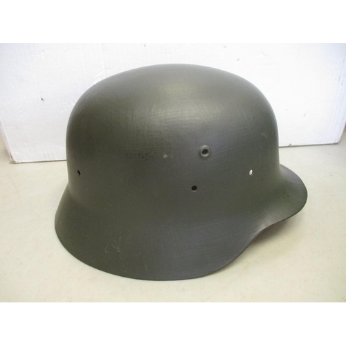 171 - Helmet range with German M42 repainted shell, British 1940 MKII helmet stamped F&L 1940 (Fisher & Lu... 