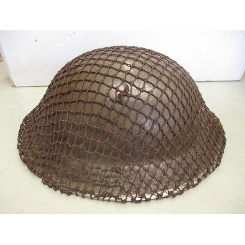 171 - Helmet range with German M42 repainted shell, British 1940 MKII helmet stamped F&L 1940 (Fisher & Lu... 