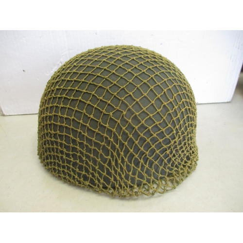 171 - Helmet range with German M42 repainted shell, British 1940 MKII helmet stamped F&L 1940 (Fisher & Lu... 