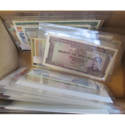 233 - Large, wide ranging accumulation of world banknotes in plastic wallets, generally extremely fine to ... 