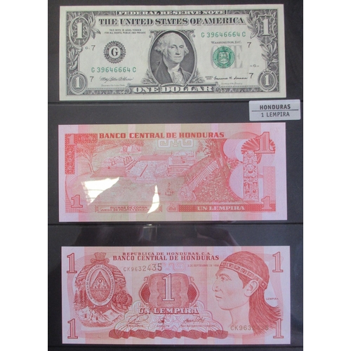 234 - Collection of various world banknotes in album, generally very fine to near uncirculated, includes A... 