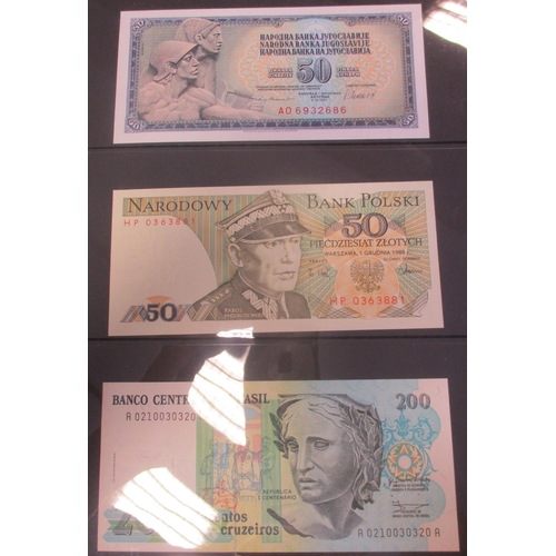 239 - Collection of world banknotes, generally extremely fine to near uncirculated, includes Brazil, Egypt... 