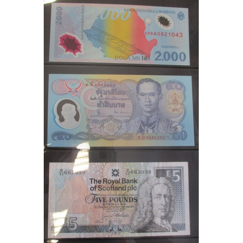 240 - Collection of world banknotes in album, generally very fine to near uncirculated, includes Channel I... 