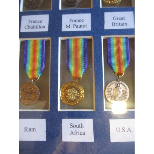 87 - 3 sets of 16 miniature WW1 Victory Medals with each medal identified, 2 sets in presentation boxes, ... 