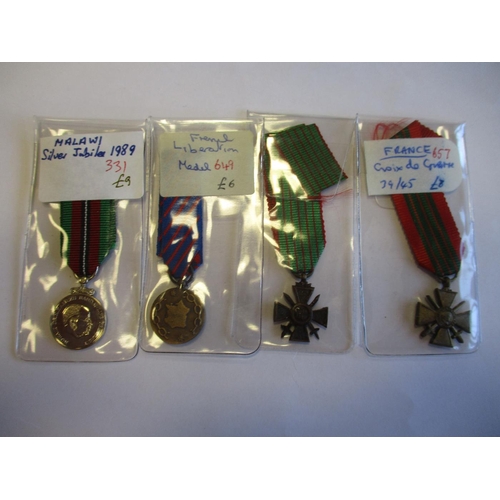 91 - World miniature medal range with Guyana (9), Nigeria (7), Ghana (3), France (3), UN (2) and Malawi ,... 