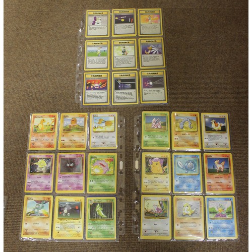 73 - Pokemon. Base set unlimited edition part set in light played to good condition, including holo rare'... 