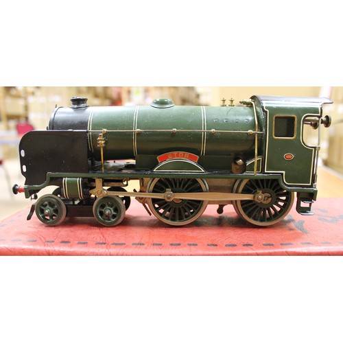 402 - Hornby. O gauge 4-4-0 clockwork locomotive and tender Southern green Schools 'Eton' No.900 good plus... 