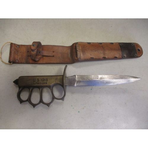 89 - U.S. Model 1918 knuckleduster trench knife Landers, Frary & Clark and scabbard, hilt stamped U.S. 19... 