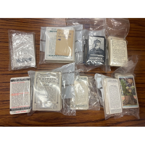 16 - Collection including paper albums, stock books, cigarette card packets, loose, trade cards etc inclu... 