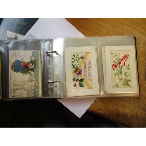 187 - Misc. coln. Small modern album with embroidered silks greetings type. Christmas greetings with snowm... 