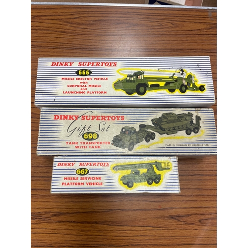 480 - Dinky. Military themed with Missile erector with launching platform No 666, tank transporter No 698 ... 