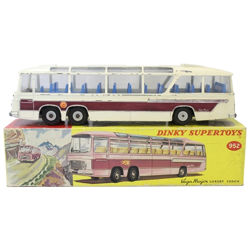 489 - Dinky. Vega Major luxury coach purple side, blue interior No 952 generally good in good box. (See ph... 