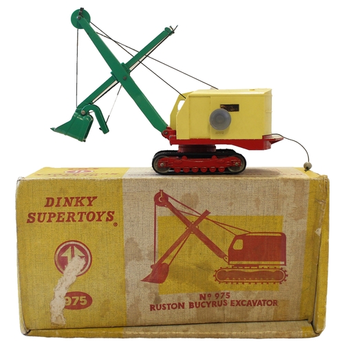 490 - Dinky. 975 'Ruston-Bucyrus' Excavator, pale yellow body with red jib and bucket, near excellent in g... 