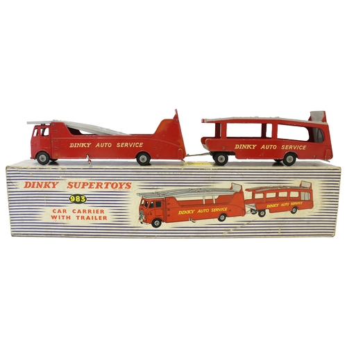 491 - Dinky. Car carrier with trailer in working order No 983 generally good in good box. (See photo) (B)