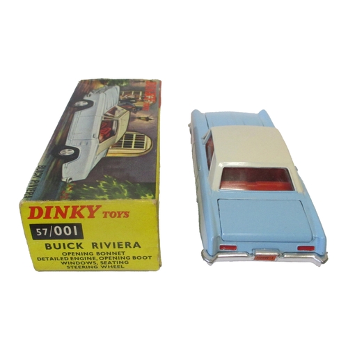 493 - Dinky (Hong Kong). Buick Riviera No. 57/001, light blue/ cream body, red interior, chrome trim, cast... 