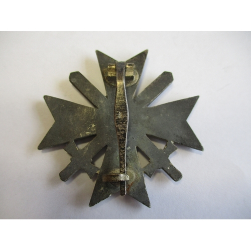 78 - Third Reich. 1939 War Merit Cross First Class With Swords, pin stamped L15, pin slightly bent due to... 