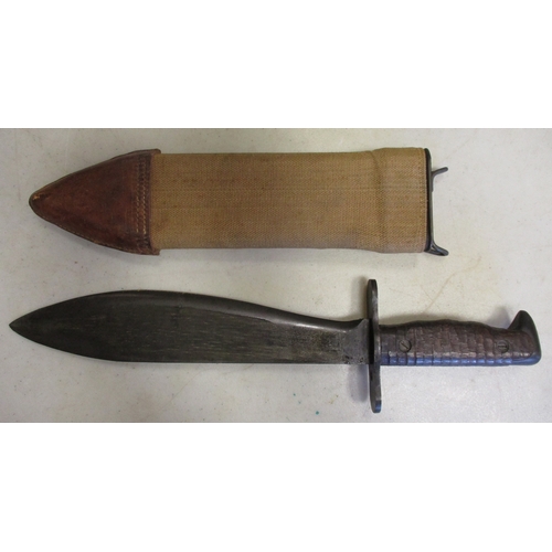 114 - U.S. Model 1917 Bolo knife and scabbard, ricasso stamped MOD191*, canvas covered scabbard, leather c... 