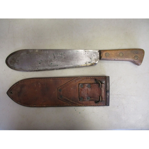 122 - WW2 U.S. Marine Corps Bolo knife and scabbard by Briddell, blade stamped U.S.M.C./Briddell, leather ... 