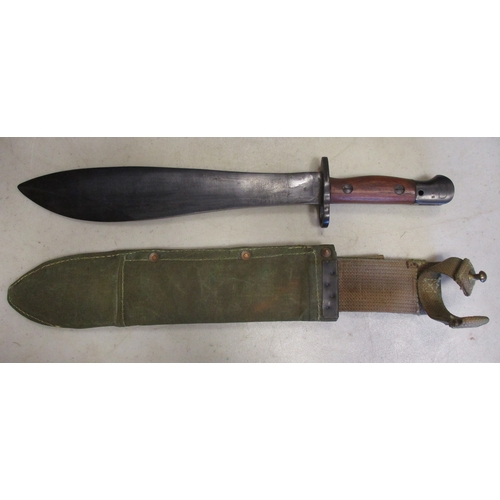 97 - Australian 1944 Mk 1 Machete Bayonet and canvas scabbard, ricasso stamped with broad arrow, grip sta... 