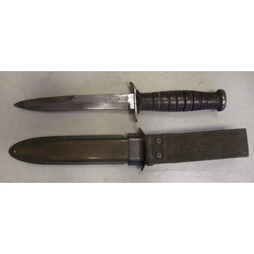 113 - U.S. M3 trench knife with M8 scabbard, blade unmarked, crossguard face marked US M3/Camillus, scabba... 