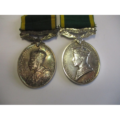 14 - Range with:
1. 1911 Metropolitan Police Coronation Medal to P.S.  W. North.
2. KGV Efficiency Medal ... 