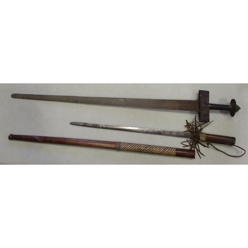 141 - Tribal swords with:
1. West African Burkina Faso Lobi Tribe 19th or 20th century ceremonial sword, d... 