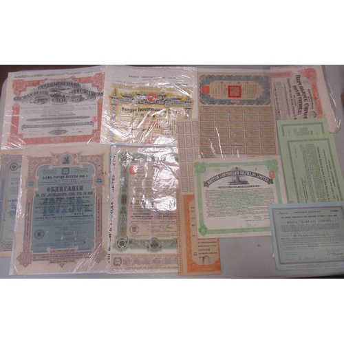 483 - Collection of various world stock and bond certificates, generally very fine or better, strength in ... 