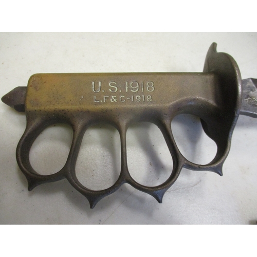 81 - U.S. Model 1918 knuckleduster trench knife by Landers, Frary & Clark and scabbard, hilt stamped U.S.... 