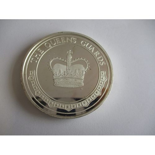 903 - The Queens Guards collection of 12 44mm silver proofs each weighing 45.5g, extremely fine or better,... 