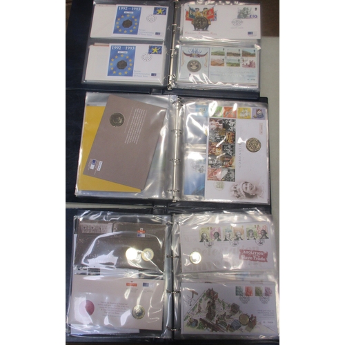 923 - Collection of uncirculated coin covers in 3 albums, includes ranges of £5, £2, £1, 50p and medals. P... 