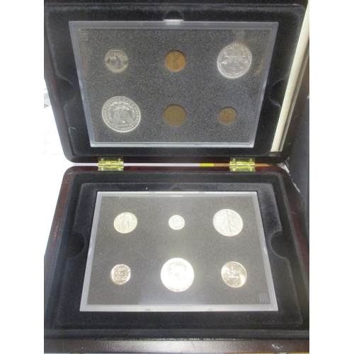 983 - USA. Range of silver $1 in display case, with proof 1986 Ellis Island, 1989 Congress and 1990 Eisenh... 