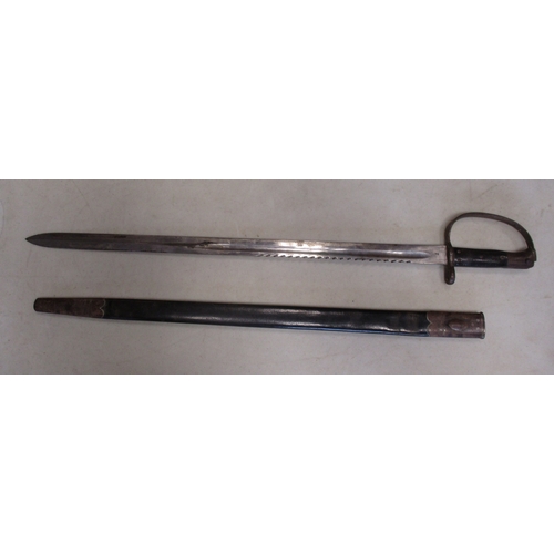 99 - 1879 Pattern Artillery carbine sawback bayonet and scabbard, ricasso with crown/V.R. over 6/85, othe... 