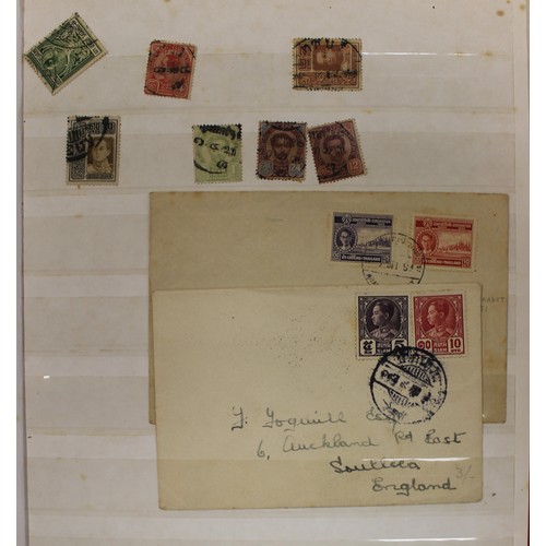 242 - Thailand. Mail into Siam. A small selection in an album comprising of 3 postcards from Great Britain... 