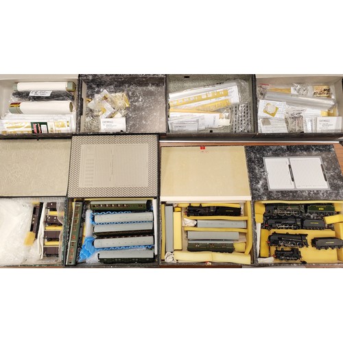437 - Range of EM/OO gauge white metal kits with some plastic wagons built to a very high standard with lo... 