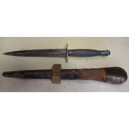 198 - Fairbairn-Sykes Third Pattern fighting knife and scabbard, crossguard stamped William/Rodgers/Sheffi... 