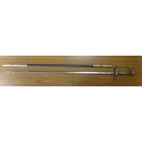 201 - Circa 1890 Pattern British Diplomatic court sword and scabbard, 30% of blade ornately etched, knuckl... 