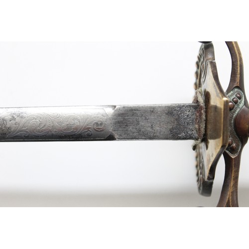 201 - Circa 1890 Pattern British Diplomatic court sword and scabbard, 30% of blade ornately etched, knuckl... 