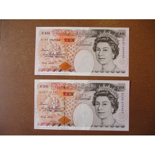 422 - M.V. Lowther. £10 Dickens range with KL01 000689 first run uncirculated , KL02 nearly extremely fine... 