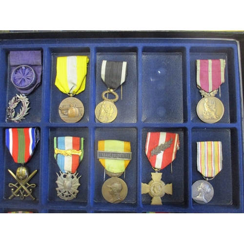 123 - France. Medal collection in 4 trays including Colonial Artillery Medal, WW1 Dardanelles Medal, AND r... 