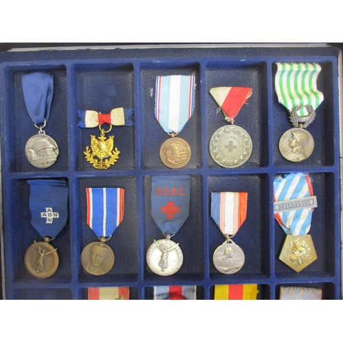 123 - France. Medal collection in 4 trays including Colonial Artillery Medal, WW1 Dardanelles Medal, AND r... 