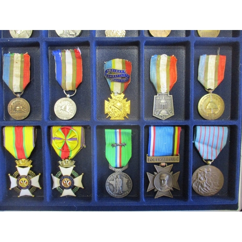 123 - France. Medal collection in 4 trays including Colonial Artillery Medal, WW1 Dardanelles Medal, AND r... 