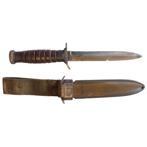 186 - U.S. M3 trench knife with M8 scabbard, blade unmarked, crossguard face marked US M3/Camillus, scabba... 