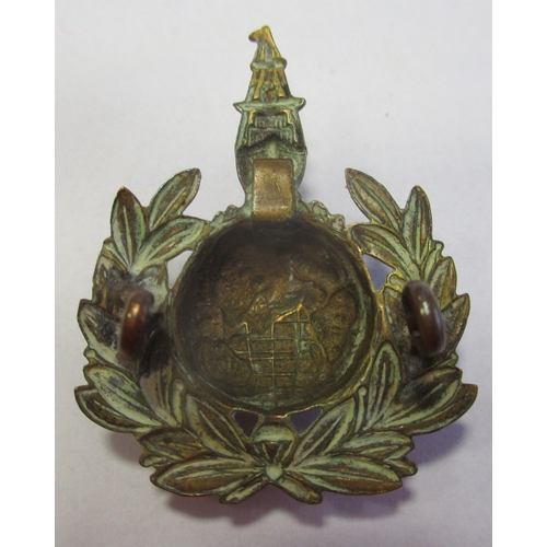 226 - Rare Royal Marines Labour Corps original brass cap badge, globe within a laurel wreath surmounted by... 