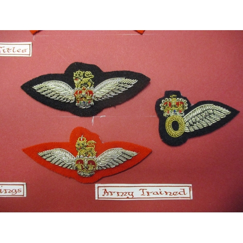 236 - Royal Marines Mess Dress Insignia collection gum attached to board for display with rank badges from... 